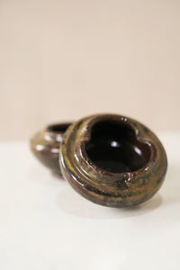 Ceramic bowl with a glossy finish on a white background